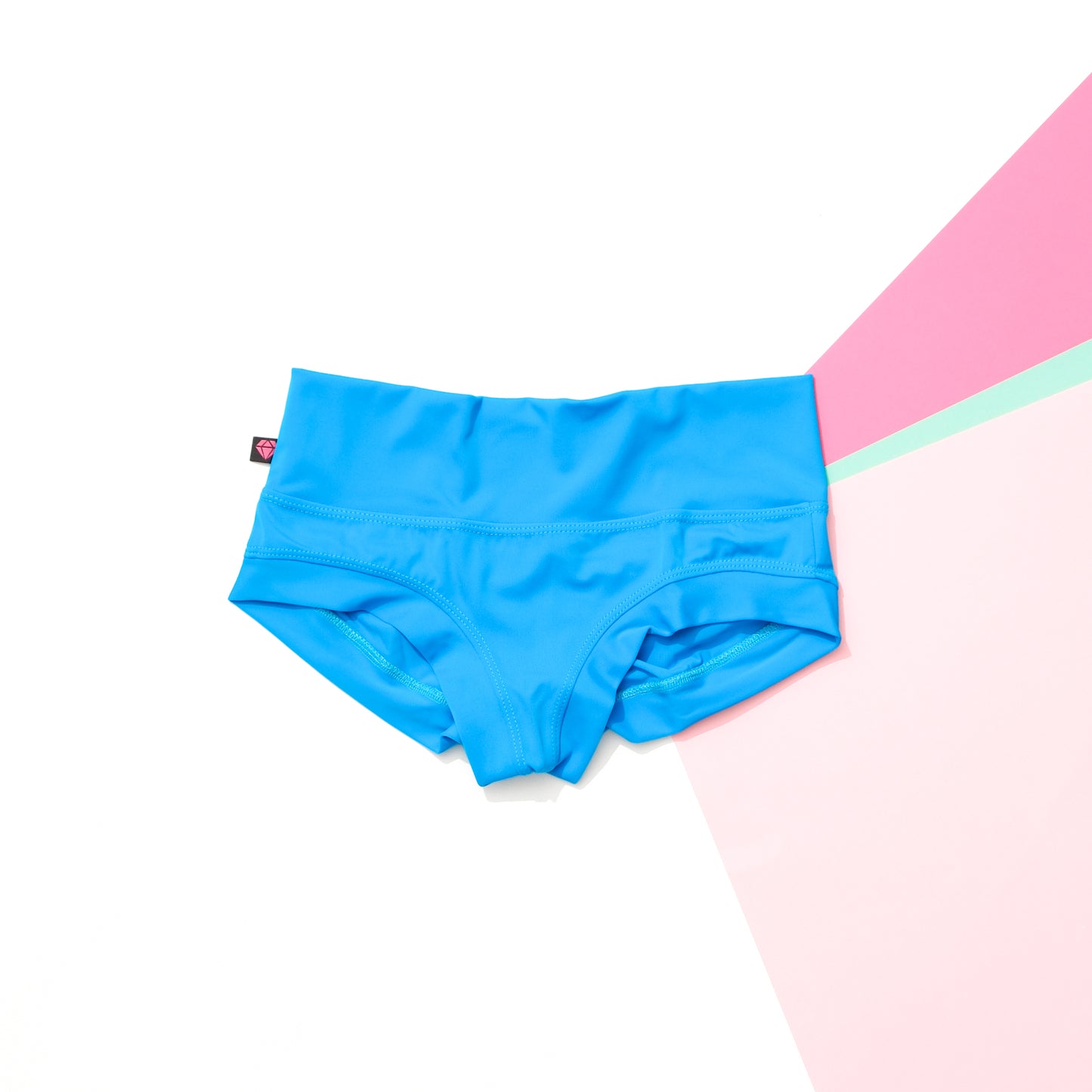 Turquoise high‑waisted pole shorts handmade in Canada
